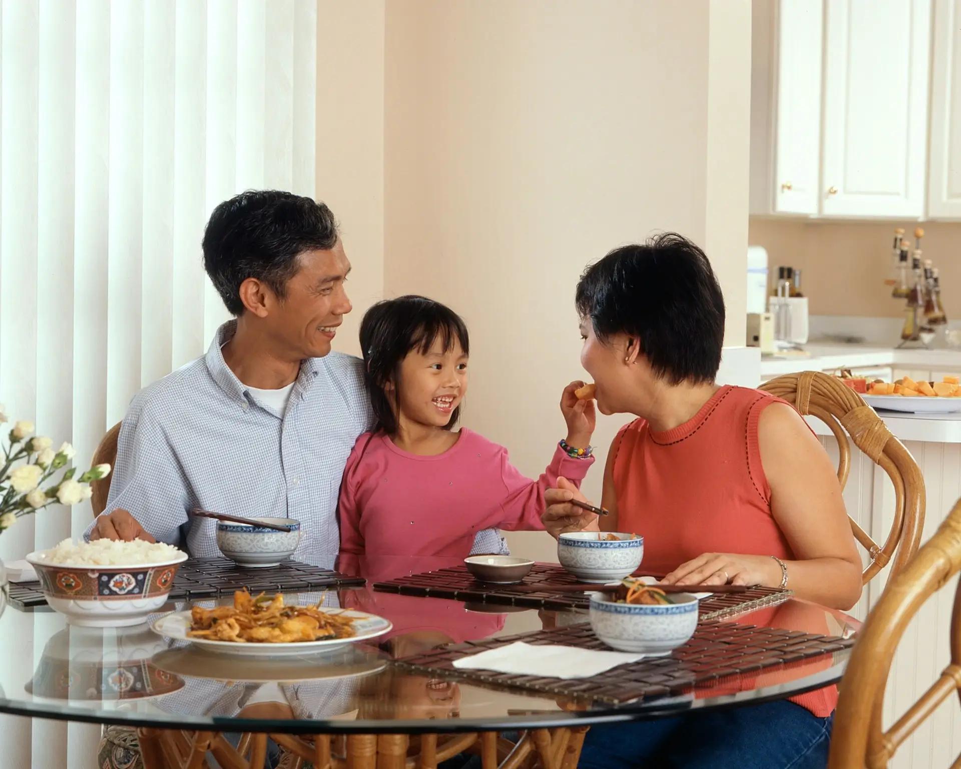 Family Eating At Table